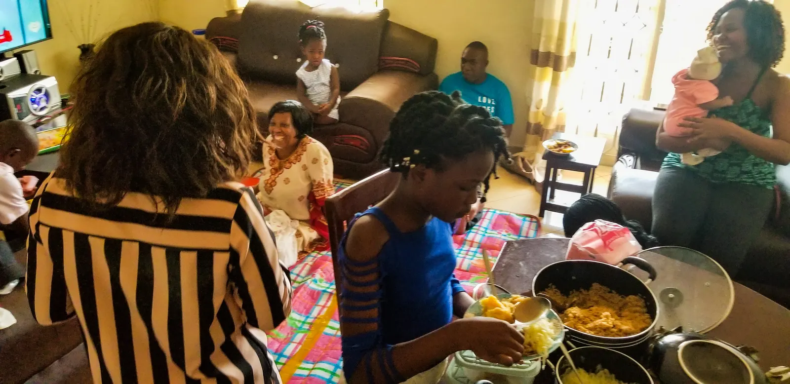 A family at home in Uganda